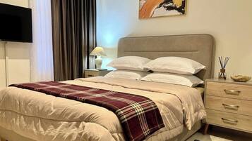 2 slaapkamers, een strijkplank/strijkijzer, gratis wifi, beddengoed