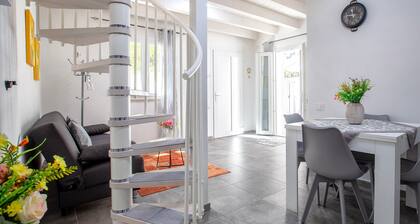 Apartment 'Casa Angela' with Private Garden, Balcony and Air Conditioning