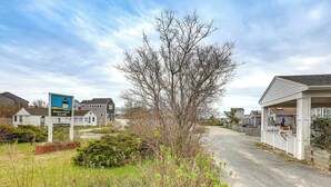 A private property with a beach club sign, a large tree, and residential houses. - Beach & Pool 318 sqf Cozy Condo East End P-town (Provincetown)