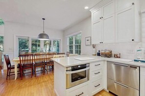 Fridge, microwave, oven, stovetop - Town of Rehoboth Beach spacious house w/patio, deck, grill, partial lake view (Rehoboth Beach)