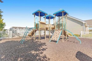 Children’s area - Dog-friendly townhome w/gas grill, balcony, on-site pool, tennis & basket courts (Rehoboth Beach)