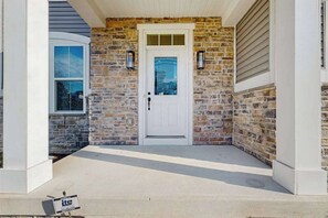 Exterior detail - Grande at Canal Pointe home with pools, sports courts, & gym (Rehoboth Beach)