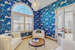 TV, fireplace - Grande at Canal Pointe home with pools, sports courts, & gym (Rehoboth Beach)