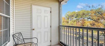 Well-stocked Creekwood townhome with pool, balcony, board games, W/D, & AC