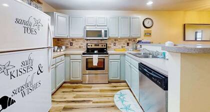 The Palms water-view condo near beach with outdoor pool, streaming, balcony, AC