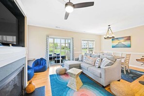 TV, fireplace, offices - The Tides condo with enclosed porch, balcony, fireplace, bikes, pool & hot tub (Rehoboth Beach)
