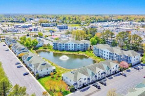 Exterior - The Tides condo with enclosed porch, balcony, fireplace, bikes, pool & hot tub (Rehoboth Beach)