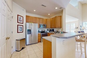 Fridge, microwave, oven, stovetop - Bear Trap Dunes golf-view condo with screened porch, pool, tennis & sauna access (Ocean View)