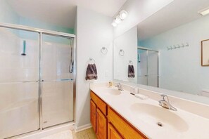 Shower, hair dryer, towels - Rehoboth Crossing townhome with pool, trails, EV charger, gym, balcony (Rehoboth Beach)