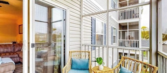 Villas at Bay Crossing dog-friendly condo with pool, balcony, water views, & W/D