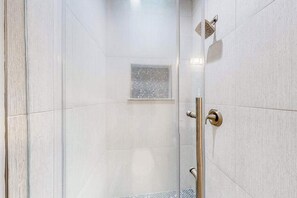 Shower, hair dryer, towels - The Tides condo with pool access, covered patio, washer/dryer & central AC (Rehoboth Beach)