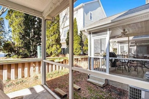 Outdoor dining - Oyster Bay Villas townhome with free WiFi, screened patio, & shared pool (Rehoboth Beach)