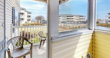 The Palms water-view condo near beach with outdoor pool, streaming, W/D, & AC