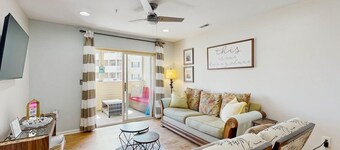 The Palms water-view condo near beach with outdoor pool, streaming, W/D, & AC