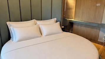 Exclusive Suite, Balcony, City View | In-room safe, laptop workspace, blackout drapes, free WiFi