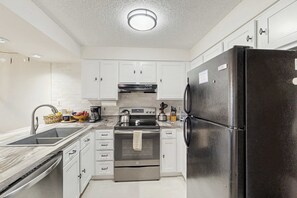 Fridge, microwave, oven, stovetop - Beachaven pet friendly condo w/community pool, patio, close to restaurants (Rehoboth Beach)