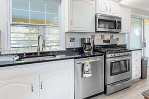 Fridge, microwave, oven, stovetop - Incredible dog-friendly Rehoboth Beach retreat with patio, deck, W/D, & sunroom (Rehoboth Beach)