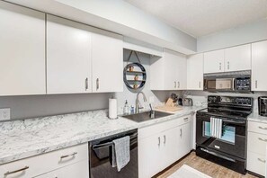 Fridge, microwave, oven, stovetop - Eagles Landing - updated condo w/two balconies, WiFi, W/D, & AC - great location (Rehoboth Beach)
