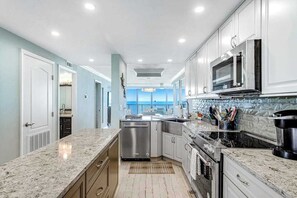 Fridge, microwave, oven, stovetop - Sea Colony Ocean 7th Floor Condo with Shared Sauna, Pool, and Gym (Bethany Beach)