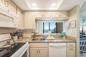 Fridge, microwave, oven, stovetop - Sea Colony ninth floor condo with shared pool, hot tub & ocean views (Bethany Beach)