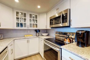 Fridge, microwave, oven, stovetop - Sea Colony Ocean 9th floor condo w/ balcony, elevator, and shared sauna (Bethany Beach)