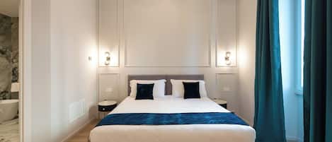 Premium bedding, down comforters, in-room safe, soundproofing