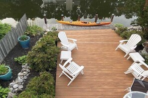 Terrace/patio - South Bethany canal-front house w/ grill, boat dock, and outdoor shower (Bethany Beach)