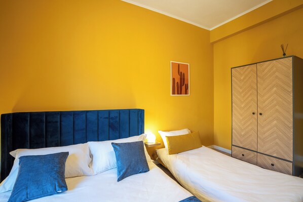 Kamar Triple Klasik | Meja kerja, ruang kerja ramah laptop, Wi-Fi gratis, dan seprai linen