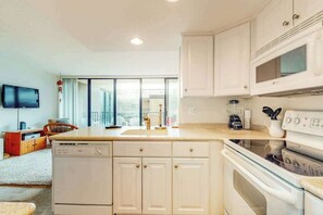 Fridge, microwave, oven, stovetop - Sea Colony Second-Floor Condo with Shared Gym, Tennis & Elevator (Bethany Beach)