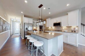 Fridge, microwave, oven, stovetop - Bayside Resort brand-new home with gas fireplace, patio, firepit, WiFi, & W/D (Selbyville)