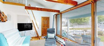 Seaside condo with patio, beach access, loft, board games, gas grill, & firepit