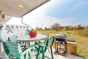 Outdoor dining - Seaside condo with patio, beach access, loft, board games, gas grill, & firepit (Chatham)