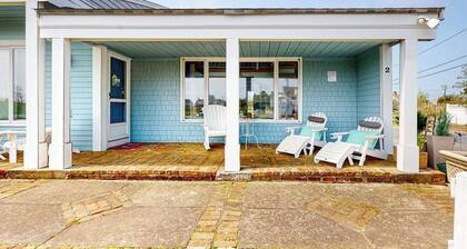 Seaside condo with patio, beach access, loft, board games, gas grill, & firepit