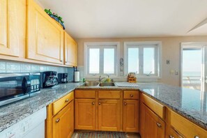 Fridge, microwave, oven, stovetop - Oceanfront home with great views, deck, grill & beach access - dog-friendly (Eastham)