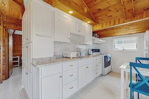 Fridge, microwave, oven, stovetop - Charming cottage with private W/D, wifi + minutes to beach (Dennis)