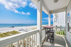 A balcony with a view of the beach and ocean. - Gulf Front | 6 Bedrooms | Spacious West Beach Retreat (Gulf Shores)
