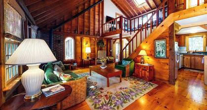 Charming home set on private lot with WiFi, sunroom, W/D, & great location