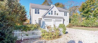 Modern getaway with central AC, home office, patio, WiFi, grill, & private yard