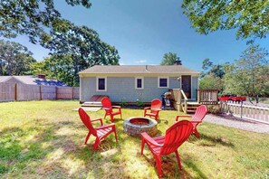 Terrace/patio - Conveniently-located home with fenced yard, firepit, beach parking pass (Hyannis)