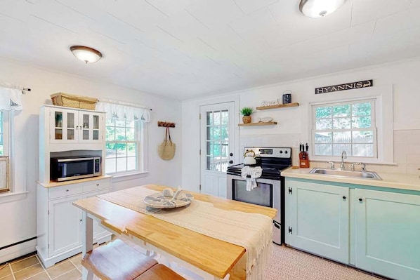 Fridge, microwave, oven, stovetop - Conveniently-located home with fenced yard, firepit, beach parking pass (Hyannis)