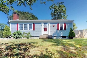 Exterior - Conveniently-located home with fenced yard, firepit, beach parking pass (Hyannis)