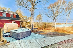 Terrace/patio - Pondfront escape with private beach, hot tub, sauna, play area & dog-friendly (Sandwich)