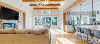 Incredible home on lake with views, private beach, deck, AC, & W/D