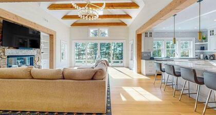 Incredible home on lake with views, private beach, deck, AC, & W/D