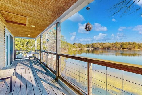 Stunning lakefront home with kayaks, games, & amazing deck views - dog-friendly