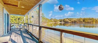 Stunning lakefront home with kayaks, games, & amazing deck views - dog-friendly