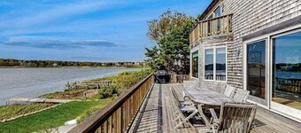 Waterfront house on Bucks Creek Marsh with deck, dock, & kayaks
