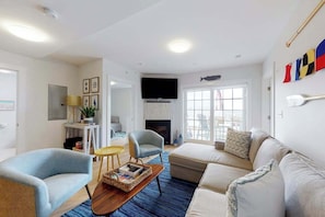 TV, fireplace, stereo, offices - Dreamy ocean-view perch with furnished balcony & beach access - dog-friendly (Dennis Port)