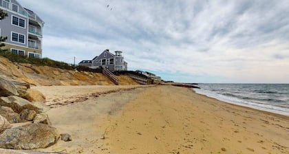 Dreamy ocean-view perch with furnished balcony & beach access - dog-friendly