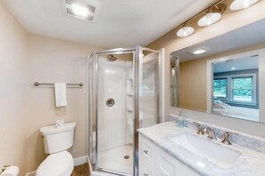 Shower, hair dryer, towels